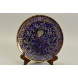 WILLIAM. S. MYCOCK FOR PILKINGTON LANCASTRIAN, a lustre plate decorated with an Indian deity