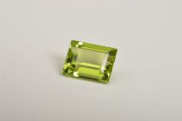 A RECTANGLE CUT PERIDOT, measuring approximately 8.1mm x 6.1mm, weighing 1.94ct
