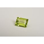 A RECTANGLE CUT PERIDOT, measuring approximately 8.1mm x 6.1mm, weighing 1.94ct