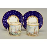 A PAIR OF STEFAN NOWACKI CABINET COFFEE CUPS AND SAUCERS, blue ground enamelled and gilded with