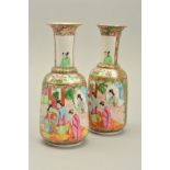 A PAIR OF LATE 19TH CENTURY CHINESE CANTON PORCELAIN FAMILLE ROSE VASES, of mallet form, decorated