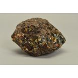 A DOMINICAN REPUBLIC ROUGH AMBER BOULDER, unpolished measuring approximately 145mm x 85mm x 95mm,