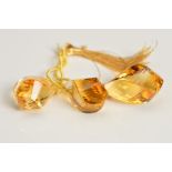 THREE CITRINE TWISTED BEADS, measuring approximately 17mm, approximate combined weight 52.45cts