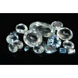 A SELECTION OF AQUAMARINES, to include various shapes and sizes, elongated oval, round, heart,