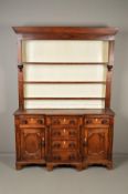 AN EARLY 19TH CENTURY OAK, MAHOGANY BANDED AND INLAID DRESSER AND PLATE RACK, the plate rack with