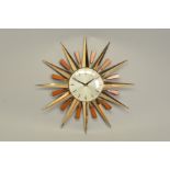 A METAMEC BRASS AND TEAK SUNBURST CLOCK, with Arabic numerals, diameter 59cm (condition: good