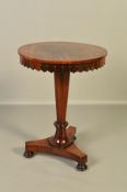 A WILLIAM IV ROSEWOOD OCCASIONAL TABLE, the circular top with a moulded pendant frieze, on an