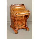 A VICTORIAN BURR WALNUT PIANO DAVENPORT, fret work gallery above the hidden stationery compartment