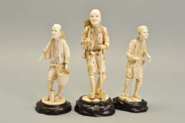 THREE JAPANESE MEIJI PERIOD IVORY OKIMONOS, comprising a sectional figure of wood cutter carrying
