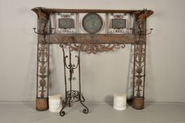 AN EARLY 20TH CENTURY WROUGHT IRON AND COPPER SPANISH HALL STAND, the overhang formed