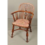 A 19TH CENTURY YEW WOOD AND ELM WINDSOR CHAIR, the hoop back with pierced vase shaped splat