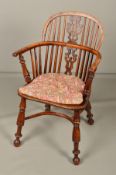 A 19TH CENTURY YEW WOOD AND ELM WINDSOR CHAIR, the hoop back with pierced vase shaped splat