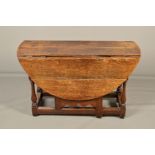 A MID 18TH CENTURY OVAL OAK GATELEG TABLE, two end drawers above wavy apron and baluster and block