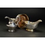 A VICTORIAN SILVER CREAM JUG, of baluster form, 'S' scroll handle, stepped circular foot, makers