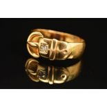 A VICTORIAN 18CT GOLD DIAMOND BUCKLE RING, an old Swiss cut diamond, estimated weight 0.05ct, ring