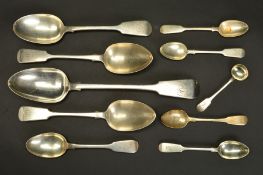 A SMALL PARCEL OF 19TH CENTURY SILVER FIDDLE PATTERN FLATWARE, including a basting spoon, maker
