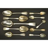 A SMALL PARCEL OF 19TH CENTURY SILVER FIDDLE PATTERN FLATWARE, including a basting spoon, maker