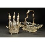 A MID 19TH CENTURY DUTCH SILVER MOUNTED GLASS CAKE BASKET, the swing handle with engraved foliate