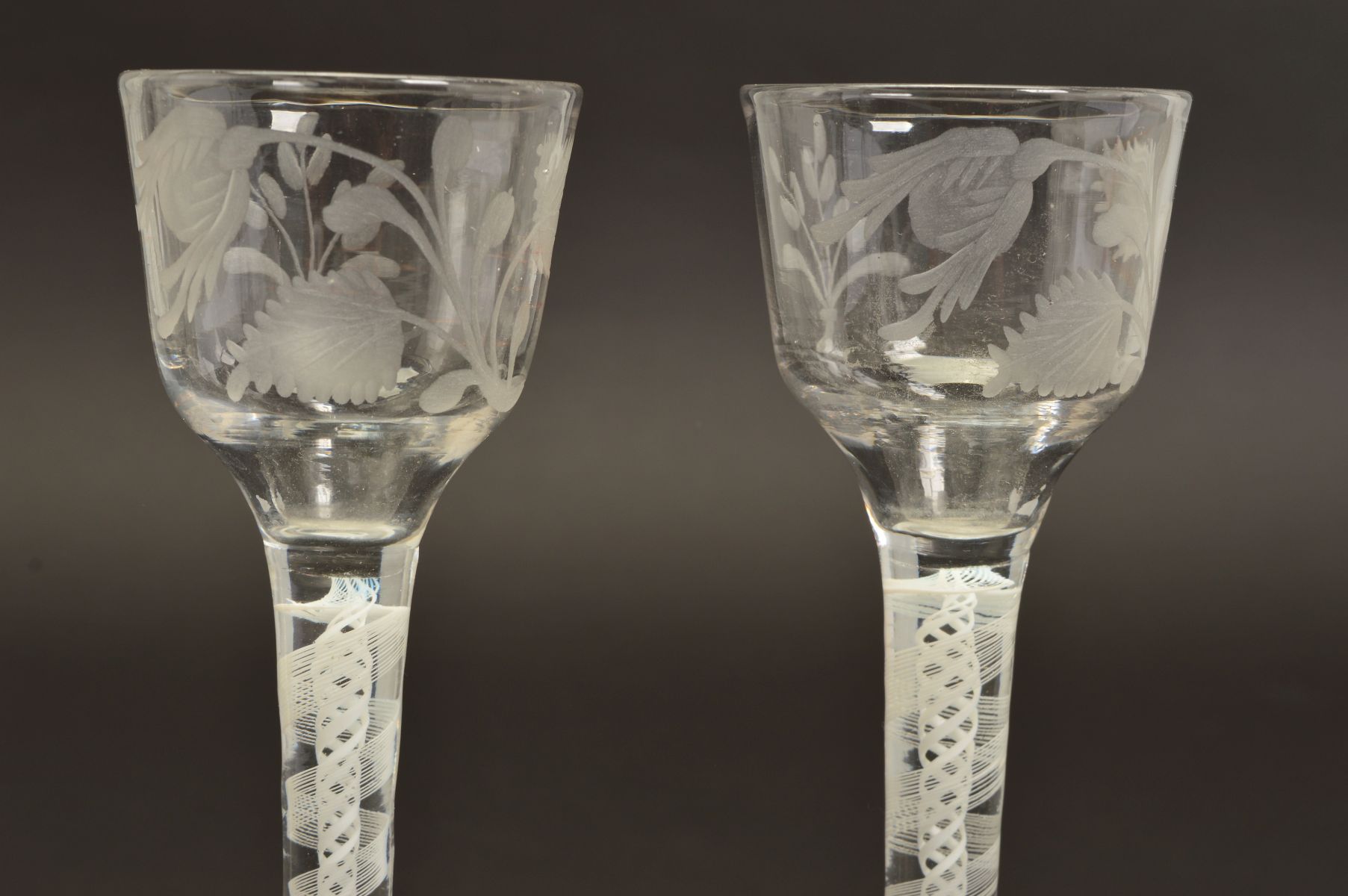 A PAIR OF 18TH CENTURY CORDIAL GLASSES, the ogee bowls engraved with flower head, leaves and a - Image 4 of 5