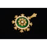 AN EARLY 20TH CENTURY GOLD PEARL AND ENAMEL BROOCH PENDANT, circular shape, centring on a flower