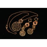 A MODERN ROSE 'ROSATO' PENDANT AND EARRING SET, each comprised of circular pierced fancy discs,