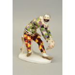 A 20TH CENTURY MEISSEN FIGURE OF THE GREETING HARLEQUIN, from the Commedia dell 'Arte Series, with
