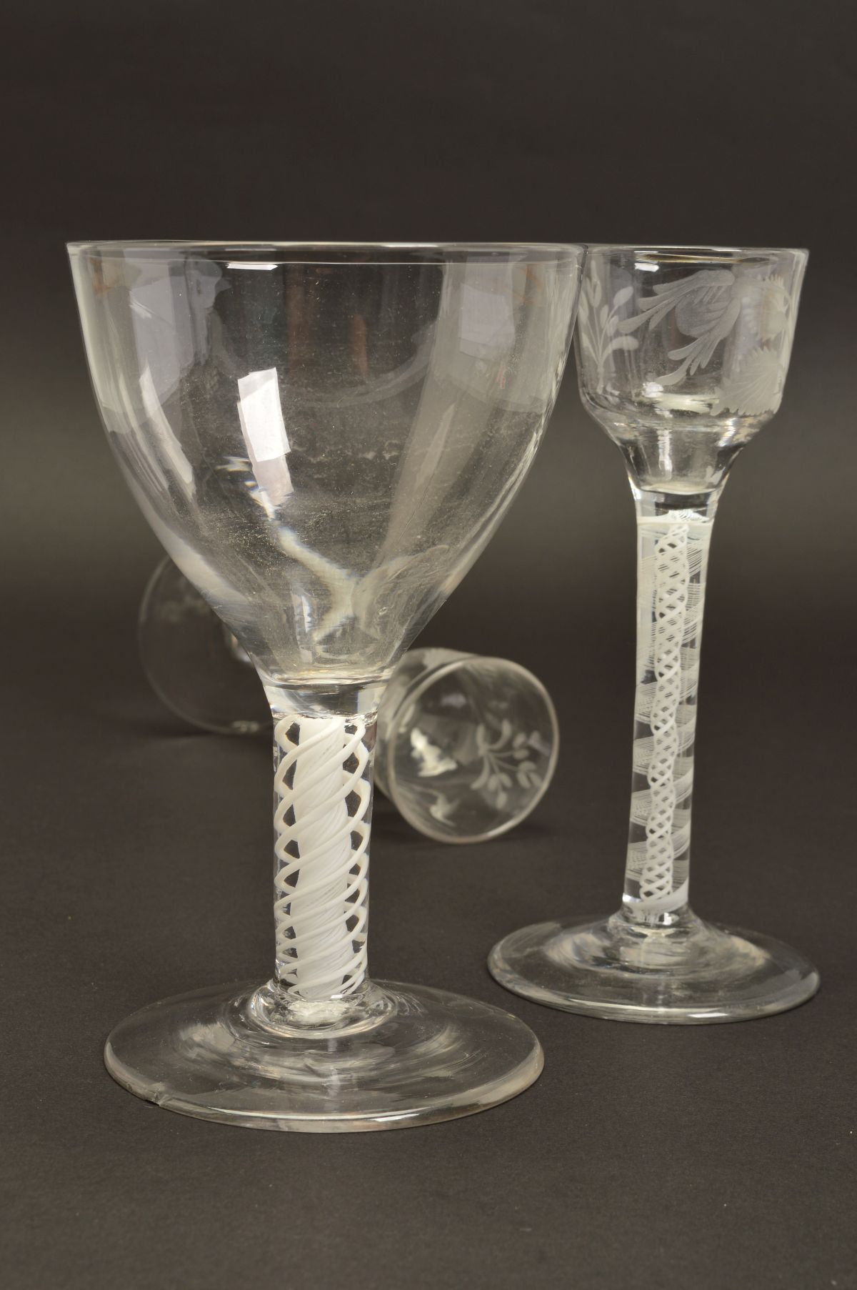 A PAIR OF 18TH CENTURY CORDIAL GLASSES, the ogee bowls engraved with flower head, leaves and a - Image 5 of 5