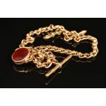 AN EARLY 20TH CENTURY 9CT GOLD SWIVEL FOB AND ALBERT CHAIN, swivel fob with blood stone and