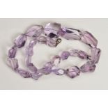 FACETED AMETHYST BEAD NECKLACE, comprising twenty five beads, graduating in size between 8mm - 30mm,