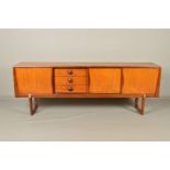 EON (ELLIOTS OF NEWBURY), a 7'4'' teak sideboard, having triple sliding doors with scalloped