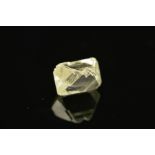 A ROUGH ELONGATED OCTAHEDRAL DIAMOND CRYSTAL, colour assessed as colour M, measuring approximately