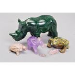 A SELECTION OF CARVED ANIMALS, to include a carved rhino, assessed as green type jasper, measuring