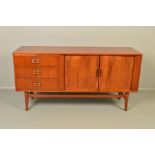 FRANK GUILLE FOR AUSTINSUITE, a teak 1960's sideboard, with double tambour front cupboard doors,