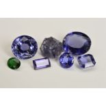 A MIXED SELECTION OF GEMSTONES CONTAINING FIVE IOLITE GEMSTONES OF VARIOUS SHAPES AND SIZES, oval,
