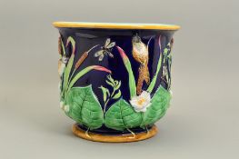 A VICTORIAN GEORGE JONES MAJOLICA JARDINIERE, of circular form, moulded with birds and dragonflies