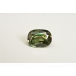 A COLOUR CHANGE ALEXANDRITE, cushion cut measuring approximately 8mm x 6mm, weighing 1.97ct,