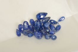 A SELECTION OF FACETED DROP SAPPHIRES, ranging in size between 5.6mm x 3.1mm - 11mm x 6.3mm, pre-