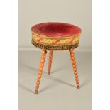A LATE VICTORIAN CIRCULAR GYPSY TABLE, the original red velvet top with tapestry border and