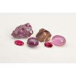 A COLLECTION OF THREE RUBIES, to include a star ruby cabochon and two cut rubies with crystals, an