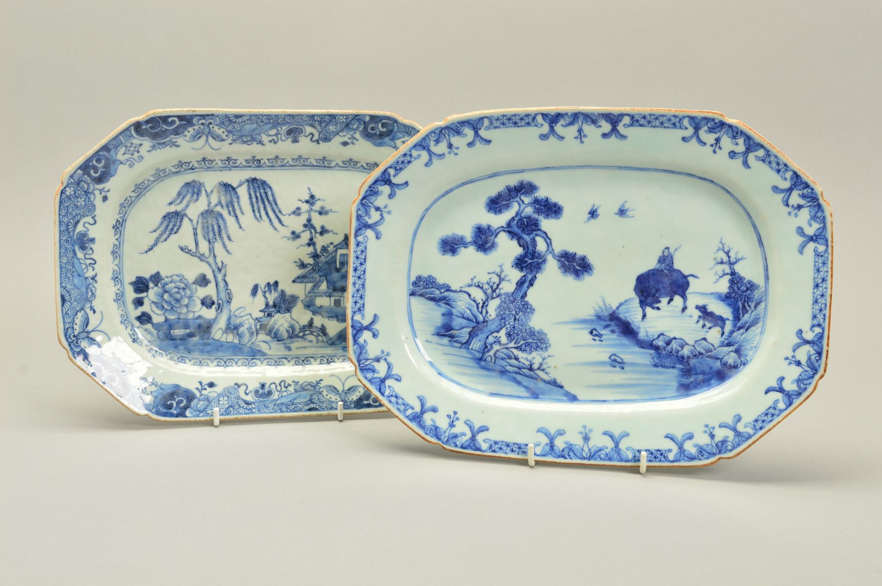 TWO CHINESE EXPORT PORCELAIN BLUE AND WHITE DECORATED MEAT DISHES, of octagonal form, one