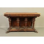 A LATE 19TH CENTURY CONTINENTAL WALNUT AND STAINED HALL TABLE, with veined red marble inset top, the