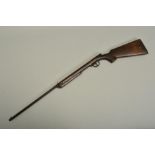 A .177'' BREAK ACTION SPRING AIR RIFLE, bearing the serial number N878 but no maker's name, its