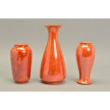THREE PIECES OF RUSKIN STUDIO POTTERY, in the orange lustre glaze, comprising a 272 shape vase,