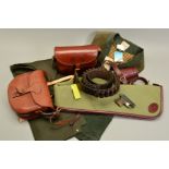 TWO HIGH QUALITY CARTRIDGE BAGS, a canvas and leather wool lined gun slip and 12 bore cartridge belt