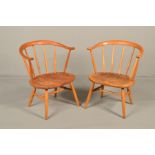 A PAIR OF ERCOL 1960'S ELM AND BEECH FIVE SPINDLE BACK COW HORN CHAIRS, (condition: good condition)