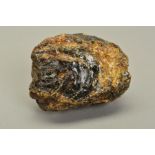 A DOMINICAN REPUBLIC ROUGH AMBER BOULDER, unpolished measuring approximately 125mm x 90mm x 75mm,