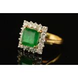 A MODERN EMERALD AND DIAMOND SQUARE CLUSTER RING, square emerald cut emerald measuring approximately