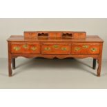 A MID 18TH CENTURY OAK DRESSER, the short raised back fitted with three short drawers and two pigeon