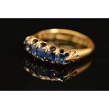 AN EDWARDIAN 18CT GOLD SAPPHIRE HALF HOOP RING, ring size O, hallmarked 18ct gold, Birmingham