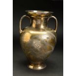 A VICTORIAN SILVER GILT TWIN HANDLED VASE, of baluster form and engraved with ferns, bearing a